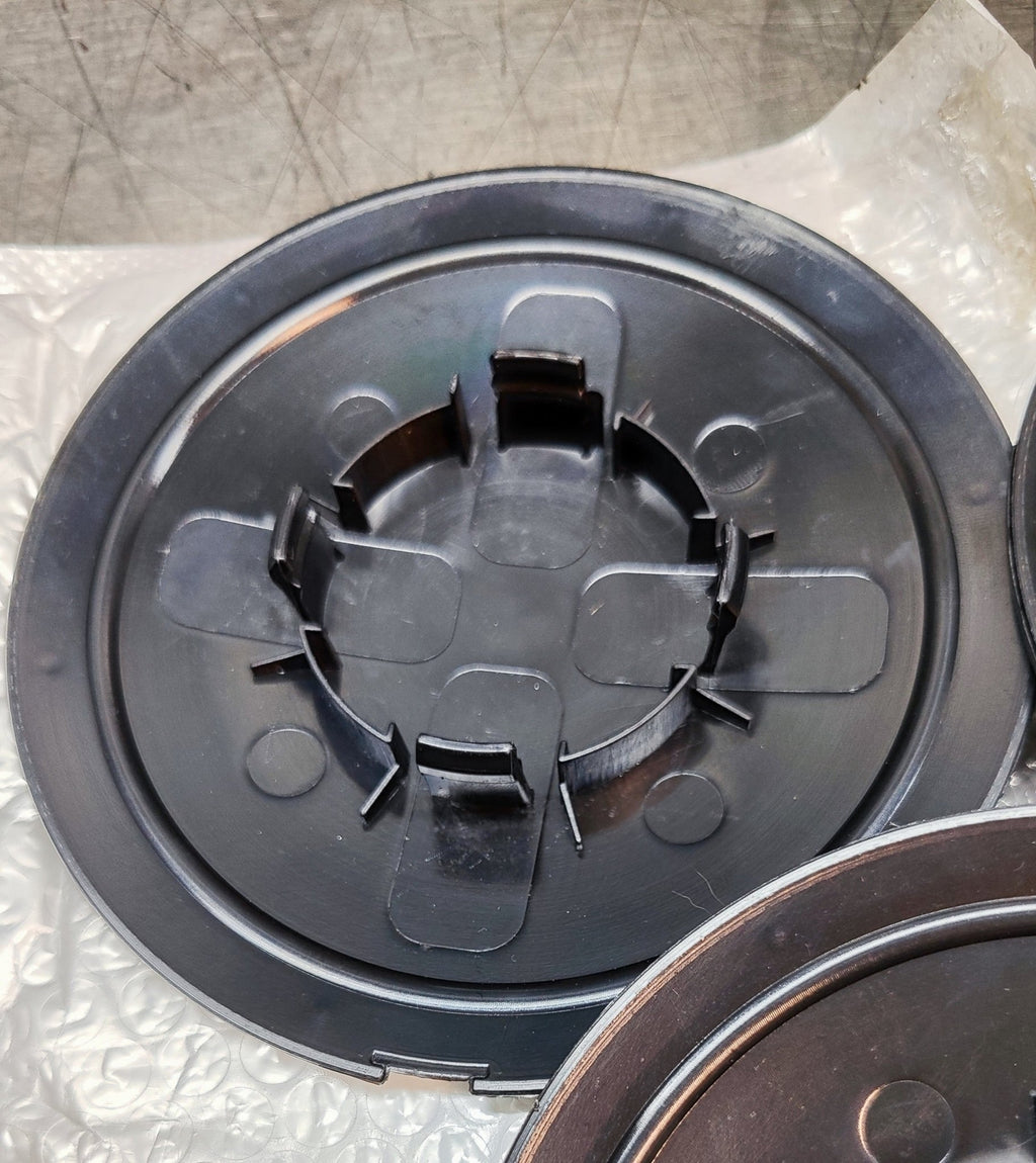 Coppetta coprimozzo copriruota nera con logo Fiat 500 - Debiautomotive